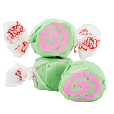 Green and pink swirled Taffy Cherry Limeade candies in white wrappers