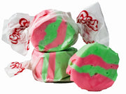 Taffy Kiwi Strawberry: pink and green swirled taffy in white paper with red branding