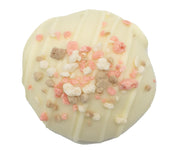 Peach Cobbler truffle with creamy white chocolate and pink beige sprinkles