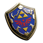 Blue and gold Zelda shield tin with Triforce, Hylian crest, and candy