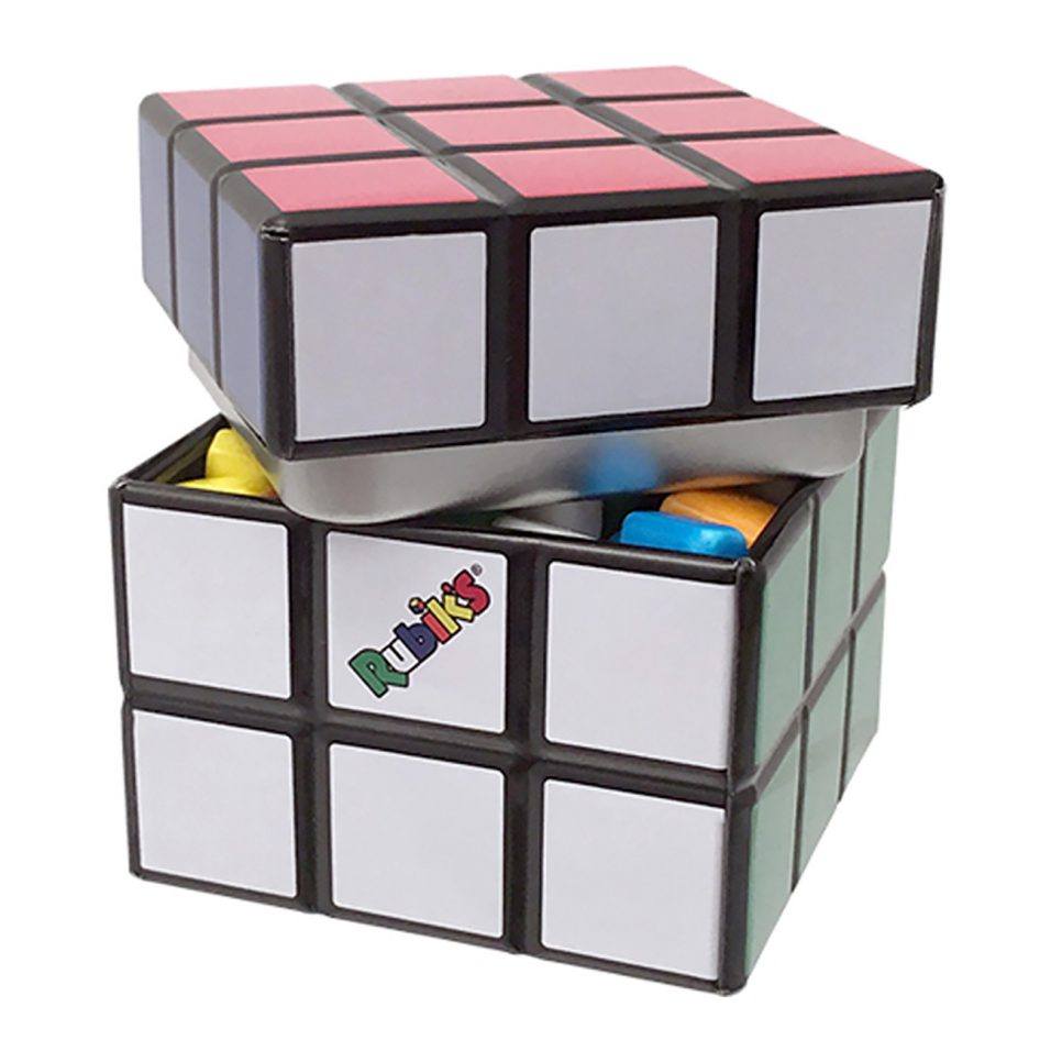 Black-framed Rubik’s Cube tin storage box in pink, white, gray with candy
