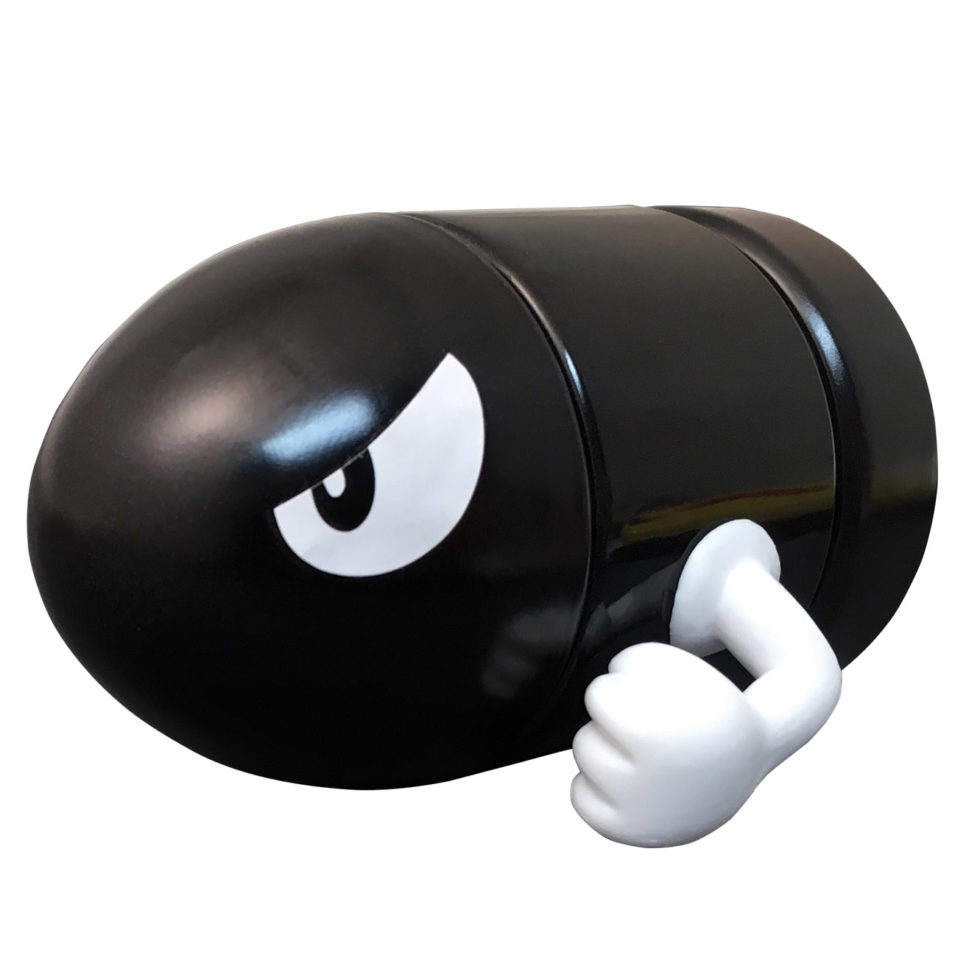 Glossy black Bullet Bill bomb figurine thumbs-up in Nintendo tin