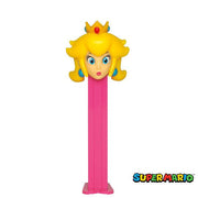 Pink PEZ Nintendo Princess Peach dispenser with yellow hair, blue eyes, turquoise earrings, and gold crown with red jewels