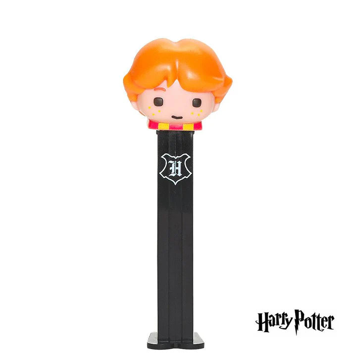 Ron Weasley PEZ dispenser with orange hair and Hogwarts crest