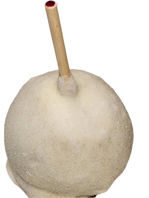 Round white Apple Pie candy apple on wooden stick