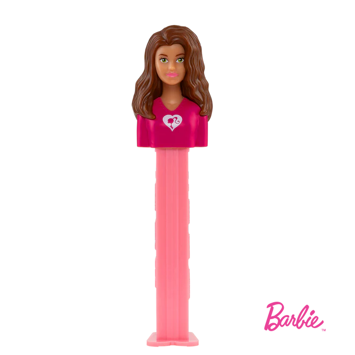 Pink plastic Barbie PEZ dispenser with brown hair, green eyes, and white heart top
