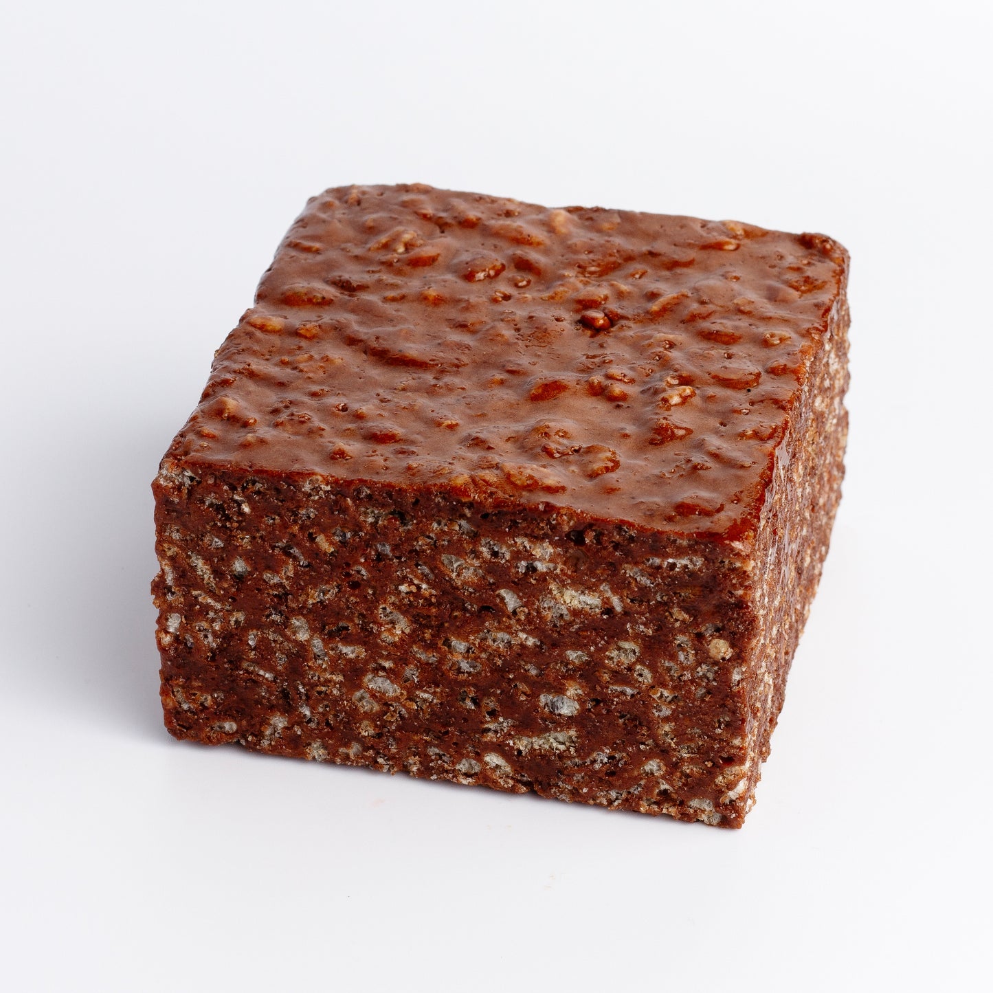 Square piece of chocolate bar on a white background