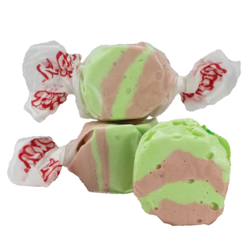 Green and pink striped taffy in Taffy Dirty Soda product, wrapped in white paper with red lettering