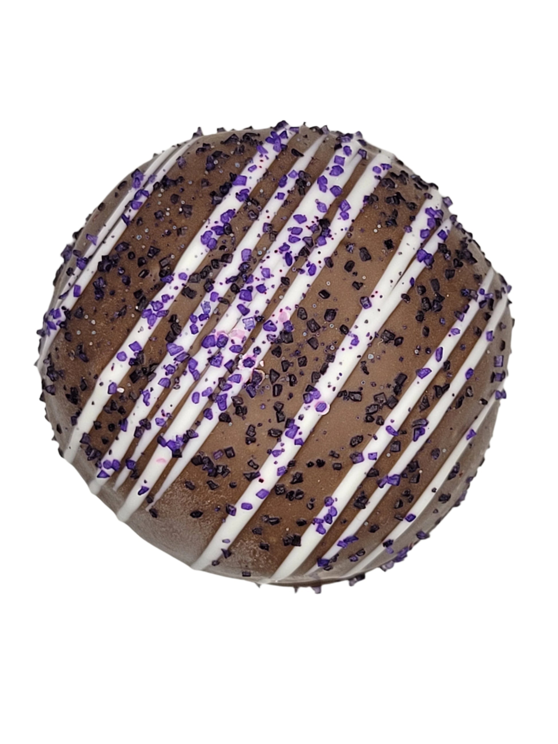 Round chocolate-covered hot cocoa bomb with white drizzle and purple sprinkles, Milk Huckleberry Truffle 1.5oz