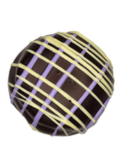 Huckleberry Lemon Cheesecake Truffle 1.5oz with lattice drizzle