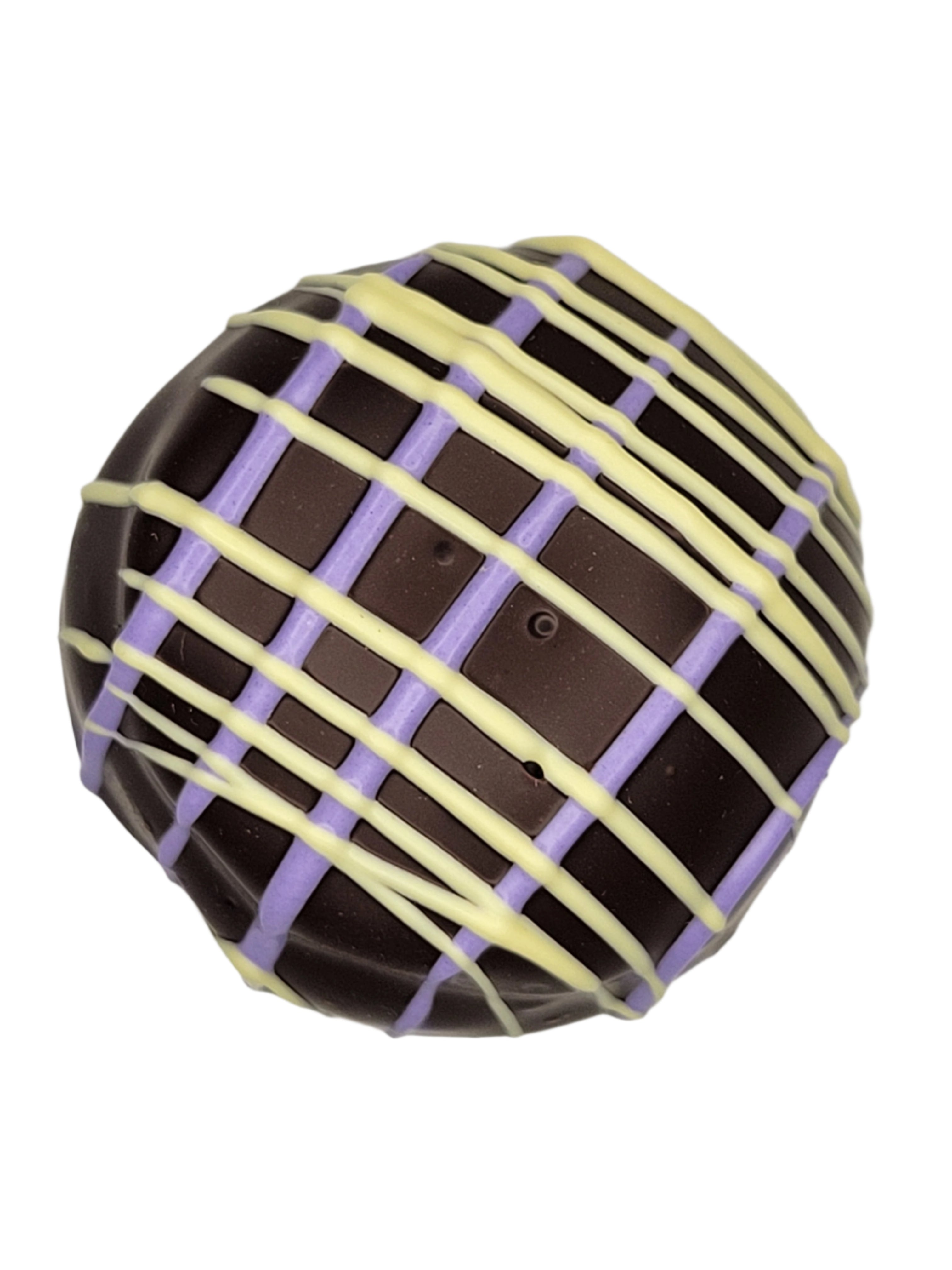 Huckleberry Lemon Cheesecake Truffle 1.5oz with lattice drizzle