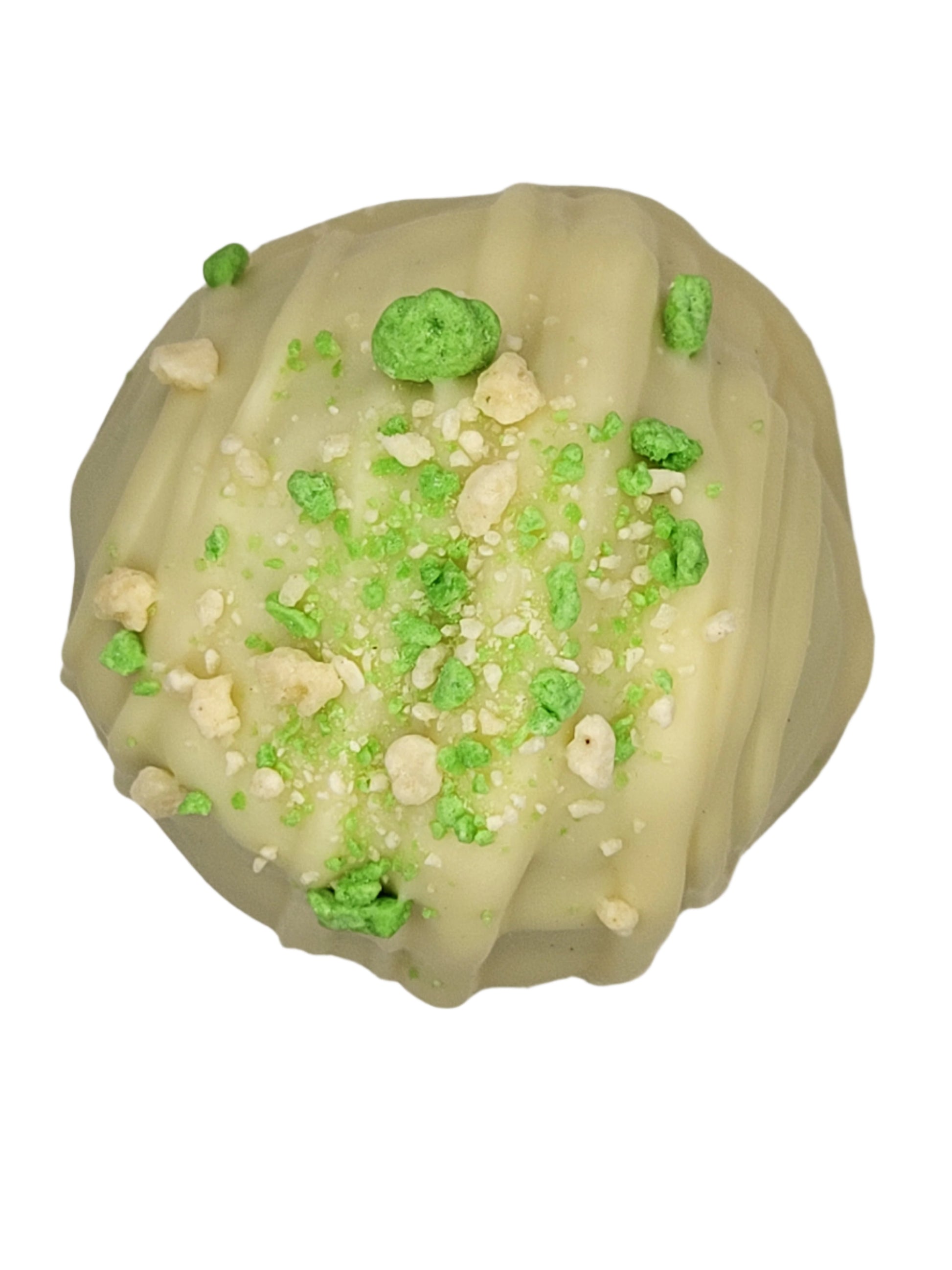 Key Lime Pie Truffle 1.5oz: pale green round truffle with ribbed surface, topped with crushed green cereal and white candy bits