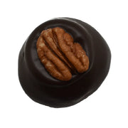 Glossy dark chocolate Bourbon Pecan Truffle 1.5oz with center pecan