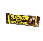Black Cow chocolate caramel bar in glossy brown and yellow wrapper