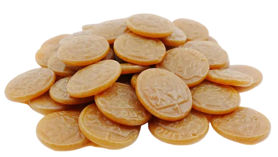 Brown licorice coins: amber gummy candies with embossed designs