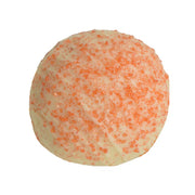 Creamsicle Truffle 1.5 oz bath bomb with orange sugar crystals