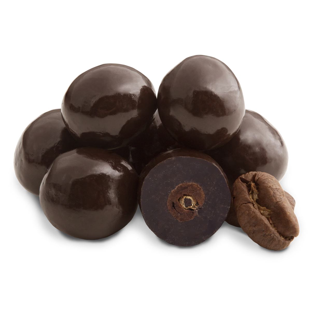 Glossy dark chocolate coated espresso beans, one sliced to reveal inner seed