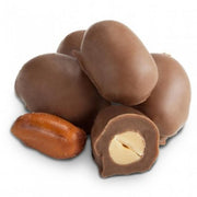 Peanuts Milk Chocolate Double Dipped: whole and cut-open chocolate-covered peanuts