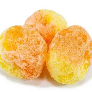 Three golden-orange sugar-coated candied citrus fruits in Crazy Bites Gummy Peach Ring 2.5 oz