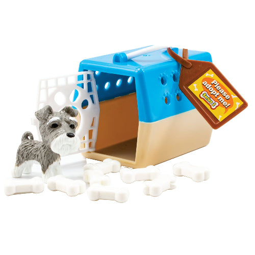 Blue and tan plastic pet carrier with please adopt me tag in Puppy Love Candy & Toys