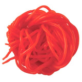 Vibrant red glossy strawberry licorice laces twisted in a knot