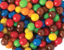 Colorful Sixlets candies in red, blue, green, yellow, and brown hues
