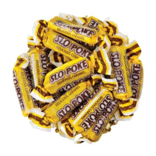 Pile of yellow and white wrapped Slo-Pokes Bite Size caramel candies