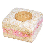 Square pink and white Crispy Strawberry Cookies & Cream Crispycake with golden-brown cookie top