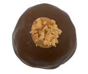 Coconut Caramel Truffle 1.5 oz: chocolate-covered caramel with toffee center